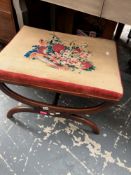 A 19th C. ROSEWOOD STOOL WITH CURVED X-FORM LEGS, THE SEAT NEEDLE WORKED WITH A BOWL OF FLOWERS
