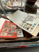 TWO STAMP ALBUMS TOGETHER WITH A 1981 VOLUME FROM STANLEY GIBBONS