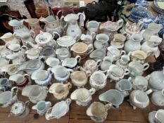 A COLLECTION OF JUGS TO INCLUDE NELSON AND WELLINGTON COMMEMORATIVES