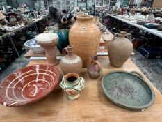 THREE TERRACOTTA FLASKS, A DAIRY BOWL, A STUDIO POTTERY DISH, A TERRACOTTA DRUM AND AN ITALIAN