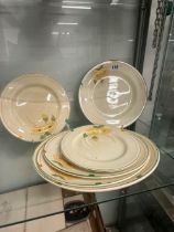 THREE CLARICE CLIFF PLATTERS EN SUITE WITH FOUR PLATES