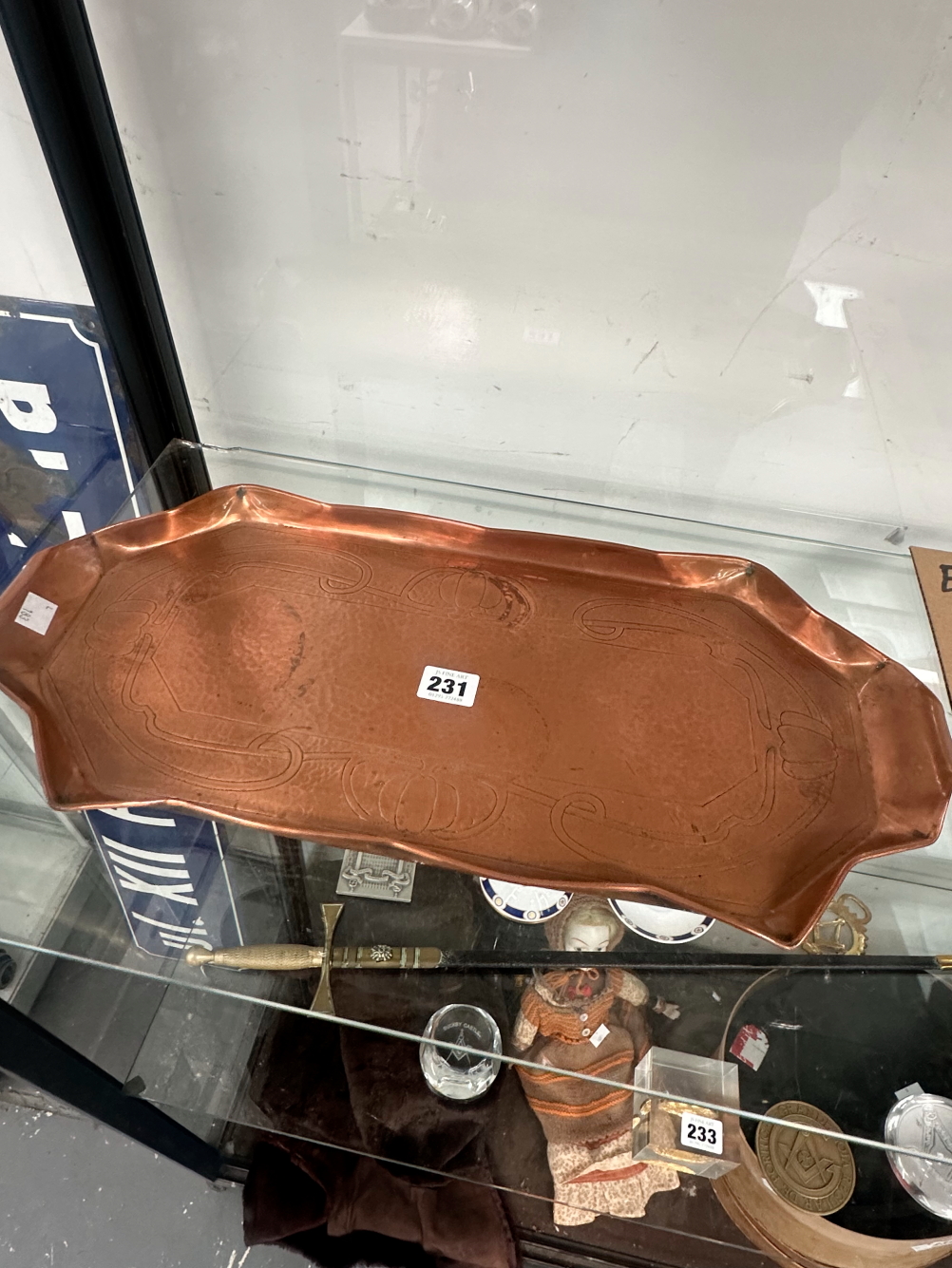 AN ART NOUVEAU COPPER TWO HANDLED TRAY