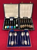 THREE HALLMARKED SILVER CASED CUTLERY SETS TO INCLUDE A HARLEQUIN ENAMEL AND GILDED SET OF COFFEE