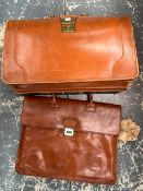 A LEATHER BRIEF CASE TOGETHER WITH ANOTHER BY SERETS