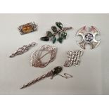 SEVEN VARIOUS CELTIC DESIGN BROOCHES, TO INCLUDE A MOSS AGATE EXAMPLE. SOME WITH HALLMARKS ALL