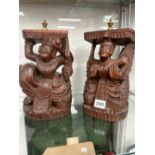 A PAIR OF CARVED WOOD MALAYSIAN FIGURES