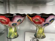 A PAIR OF BLUE SKY FOOTED BOWLS SLIP TRAILED WITH FLOWERS