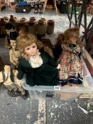A COLLECTION OF 20th C. BISQUE HEADED DOLLS TOGETHER WITH LAUREL AND HARDY FIGURES