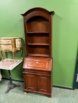 A WALNUT CONTINENTAL STYE TWO PART CABINET