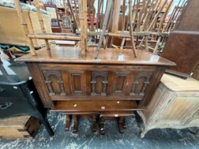 A CARVED OAK BLANKET BOX