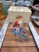 A LIMITED EDITION ROYAL DOULTON RUPERT BEAR GROUP RIDING HOME IN A FISH DRAWN SCALLOP SHELL