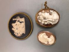 TWO CAMEO BROOCHES AND A BLACK JASPERWARE BROOCH.