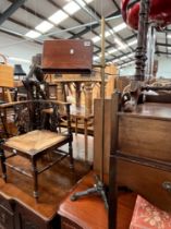 A VICTORIAN BRASS AND IRON ADJUSTABLE READING STAND