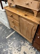 A VICTORIAN PINE THREE DRAWER SIDE CABINET