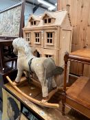 A LARGE DOLLS HOUSE AND CHILD'S ROCKING HORSE (2)