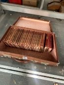 A SUIT CASE OF LEATHER BOUND RUDYARD KIPLING AND OTHER BOOKS