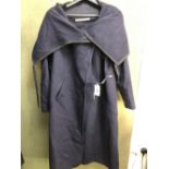 COAT: CLEMENS EN AUGUST NAVY BLUE CASHMERE AND LEATHER PANELS ON ARMS. LABEL STATES SIZE EUR 42.