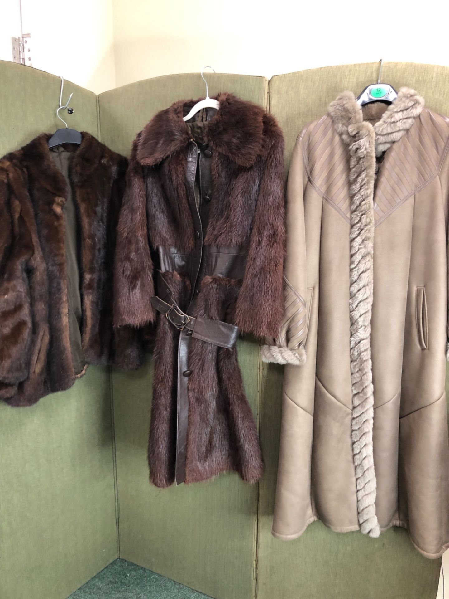 JACKET. A BROWN KESTILA TURKU FINLAND LEATHER FULL LENGTH COAT SIZE 12 WITH FAUX FUR LINING,