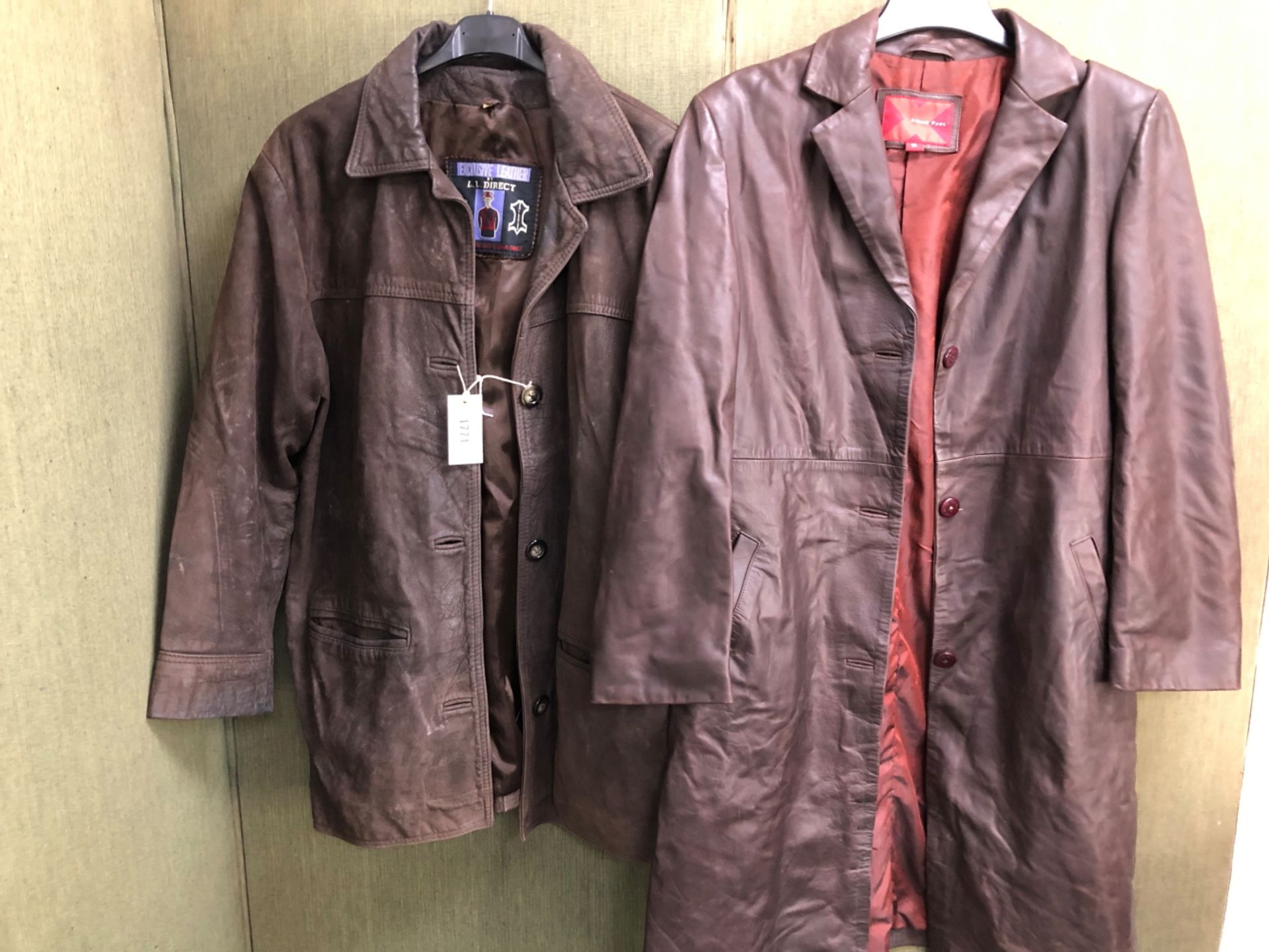 JACKET. A BROWN LEATHER JACKET, EXCLUSIVE LEATHER BY L.L DIRECT, SIZE STATED 12, PIT TO PIT 51cms,