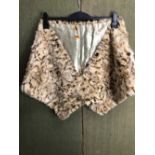 SHAWL. A VINTAGE SNOW LEOPARD FUR SHAWL WITH SILK LINING. LENGTH 136cms.