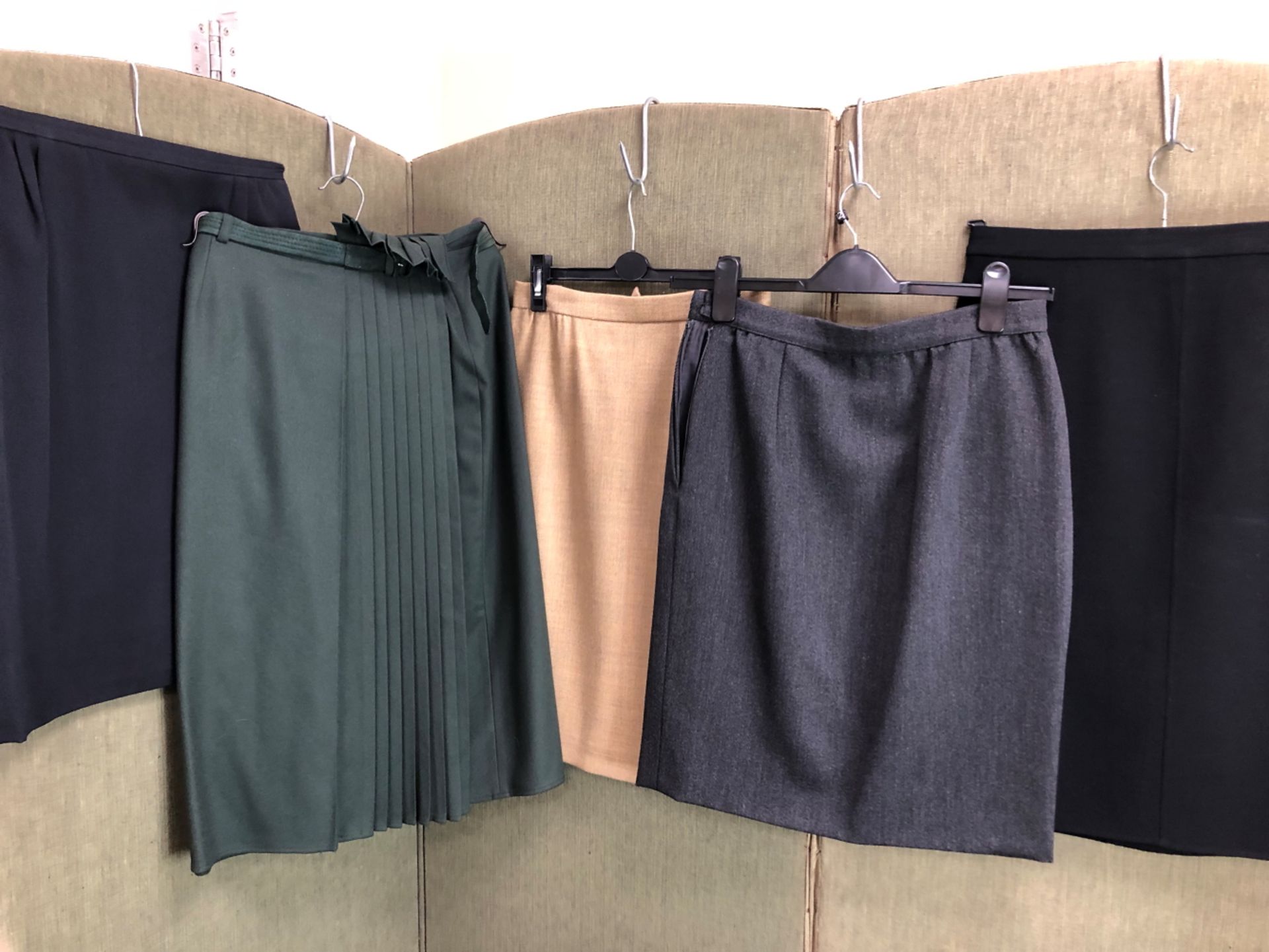 SKIRTS: A GREEN WOOL GIANNI VERSACE SKIRT SIZE 44, A DARK GREY VALENTINO SKIRT SIZE 12, A BLACK JILL