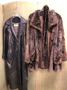 COATS: A PICCINI, VINCI-ITALIA LONG BLACK LEATHER TRENCH TYPE COAT WITH BELT TAG STATES SIZE 38,