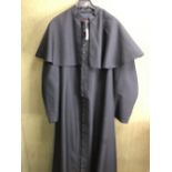 CASSOCK. A WIPPELL & CO ROMAN CATHOLIC BLACK CAPED CASSOCK. SHOULDER TO HEM 154cms.