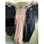 DRESSES. A LYDIA CARLTON FRENCH BLACK DRESS WITH VELVET PANELS SIZE 42, TOGETHER WITH A BLACK