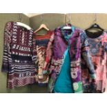 A DESIGUAL MULTI COLOURED MULTI PATTERNED MULTI PRINT COAT SIZE 42, TOGETHER WITH TWO TUNIC