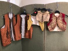 WAISTCOATS. THREE VARIOUS EASTERN WAISTCOATS AND TWO CHILD'S LACE UP BODICE TYPE TOP.