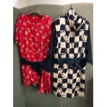 TWO 1980's STYLE DRESSES ONE GOLD AND BLACK FLORAL CHECK SHOULDER TO CUFF 54cm SHOULDER TO HEN 105cm