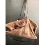 A VERY LARGE PALE BROWN TRAVEL BAG LENGTH 76cm.