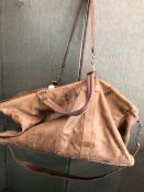 A VERY LARGE PALE BROWN TRAVEL BAG LENGTH 76cm.