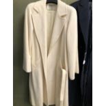 COAT. A JAEGER 100% WOOL LONG CREAM COAT, PIT TO PIT 50cms, SHOULDER TO HEM 114cms, SHOULDER TO CUFF