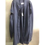 GOWN. A STARK BROTHERS BLACK GRADUATION GOWN.