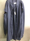 GOWN. A STARK BROTHERS BLACK GRADUATION GOWN.