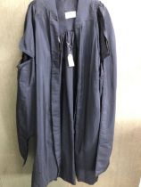 GOWN. A STARK BROTHERS BLACK GRADUATION GOWN.