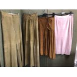 TWO PAIRS OF PATTI SEARLE PALE GREEN FLARED SUEDE TROUSERS ONE 38 INCH HE OTHER 34 INCH, TOGETHER