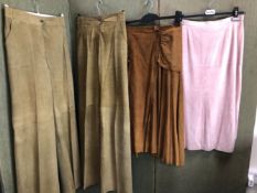 TWO PAIRS OF PATTI SEARLE PALE GREEN FLARED SUEDE TROUSERS ONE 38 INCH HE OTHER 34 INCH, TOGETHER