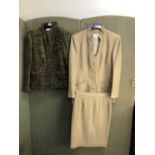 A OLIVE GREEN WOOL BLEND LADIES JACKET SIZE 44 AND MATCHING SKIRT ALSO SIZE 44, TOGETHER WITH A
