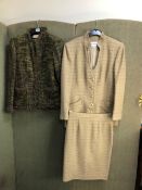A OLIVE GREEN WOOL BLEND LADIES JACKET SIZE 44 AND MATCHING SKIRT ALSO SIZE 44, TOGETHER WITH A