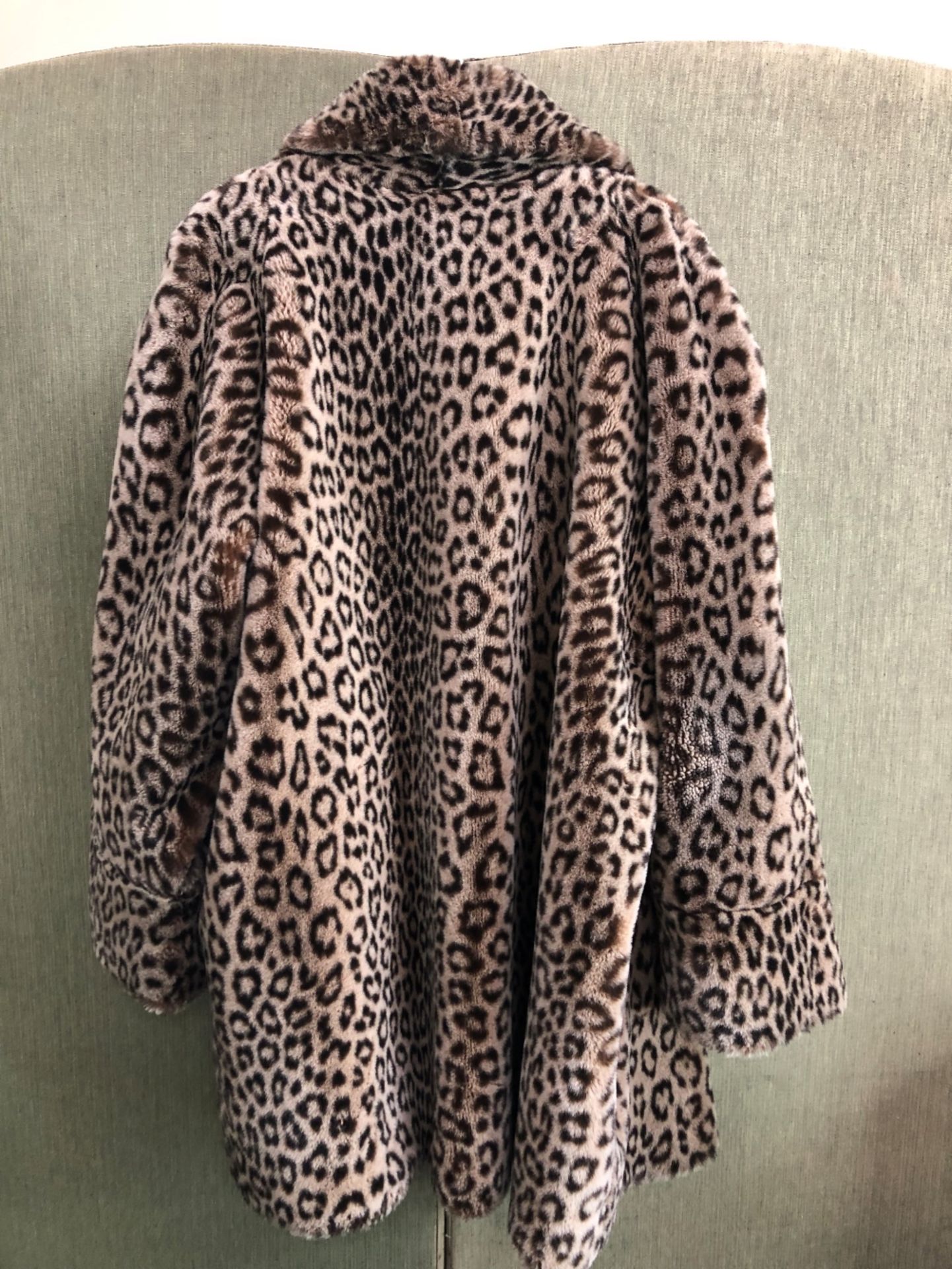 COAT: A NUAGE ANIMAL PRINT FAUX FUR COAT. - Image 4 of 4