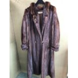 A PHILIP HOCKLEY FURS LONDON, FULL LENGTH BROWN FUR JACKET. PIT TO PIT 51cm, SHOULDER TO HEM 130cm