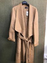 COAT: A JOSEPH 3/4 LENGTH CAMEL CASHMERE COAT. LABEL STATES EUR SIZE 40