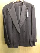 A DOUBLE BREASTED DINNER JACKET: BLACK SILK TRIMMED, CHEST 40, WAIST 40