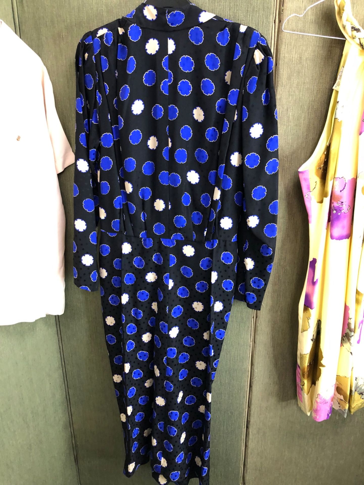 A LONG BLACK DRESS WITH BLUE AND CREAM SPOTS AND BUTTON FRONT, TOGETHER WITH A GEORGE GROSS SIZE - Image 4 of 9