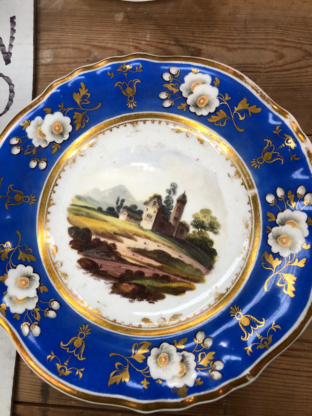 A 19th C. ENGLISH PORCELAIN DESSERT SERVICE PAINTED WITH LANDSCAPES WITHIN GILT BLUE BANDS - Image 15 of 27