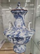 A ROYAL BONN BLUE AND WHITE FLORAL TWO HANDLED VASE AND COVER