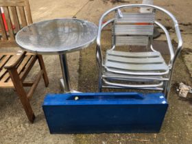 A METAL BISTRO SET AND A PLASTIC PICNIC SET