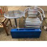 A METAL BISTRO SET AND A PLASTIC PICNIC SET